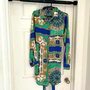 Button up dress in silk. Blue, gold and green.